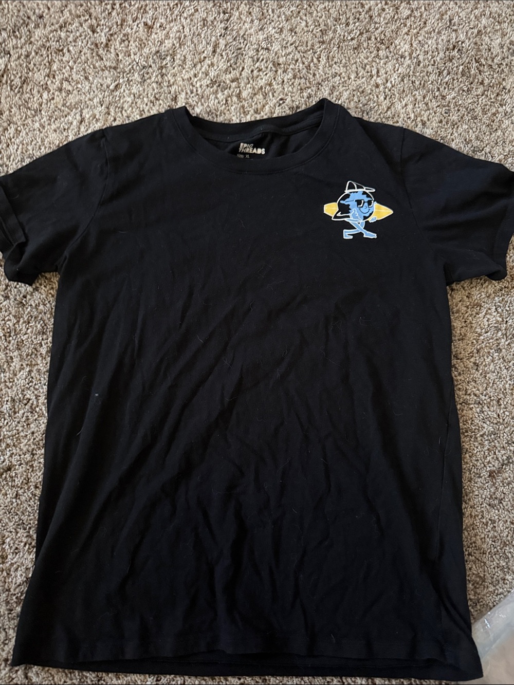 Epic Threads Black Tee with Blue Surf Character and Yellow Surfboard